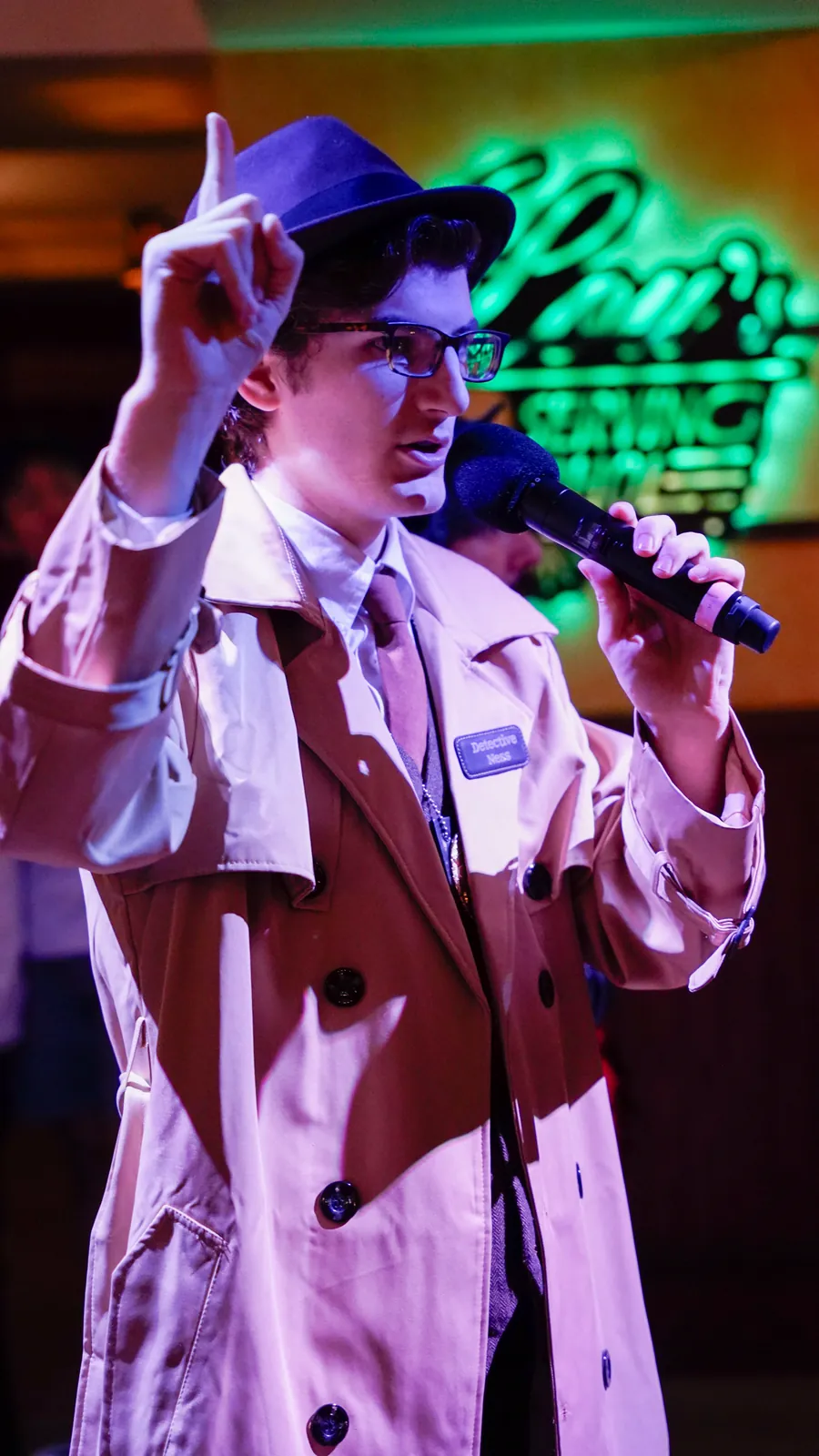 A Murder Mystery Company actor working the room at a Indianapolis show